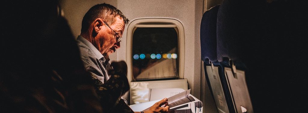 21 Things to Do On a Plane That'll Make Time FLY - Traveling Tulls