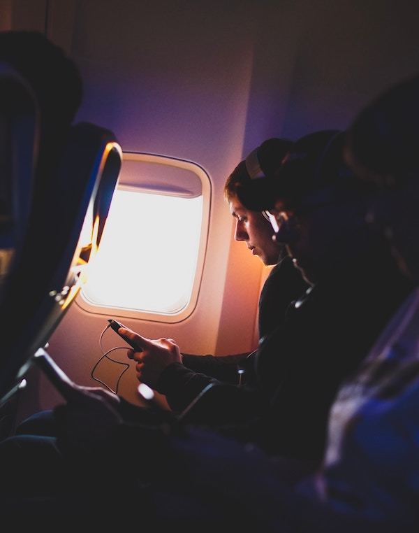 21 Things to Do On a Plane That'll Make Time FLY - Traveling Tulls