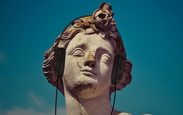 statue wearing a headset