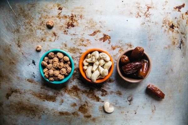 bowls of nuts and dried fruits