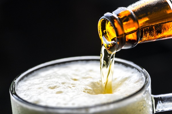 beer pouring into glass