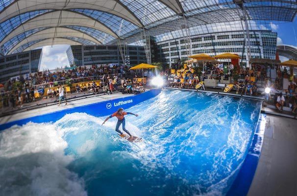 surfer on indoor wave at Munich International Airport