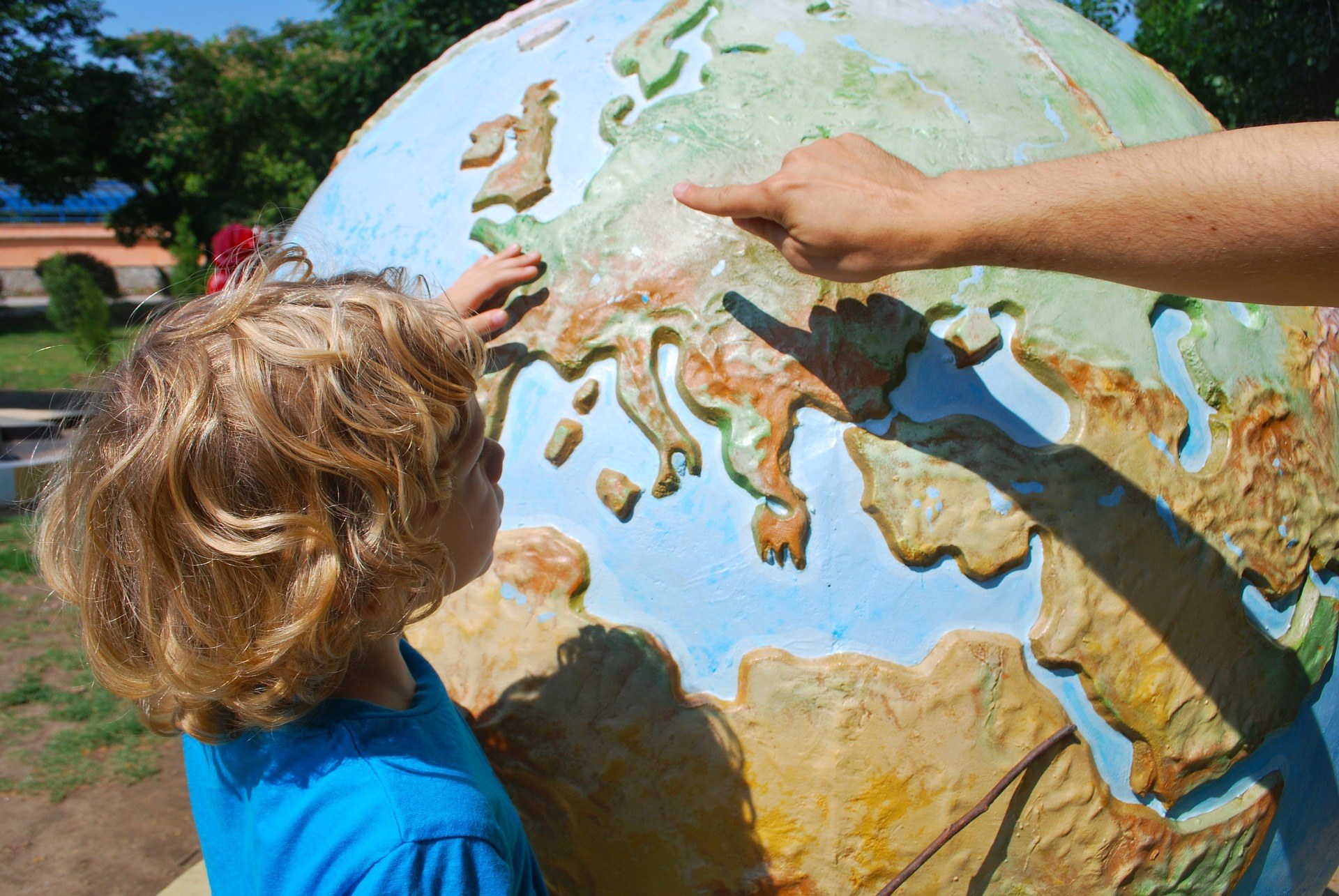 child with globe